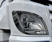 COPPIA RIVESTIMENTO INOX SU FARO DAF CON LOGO